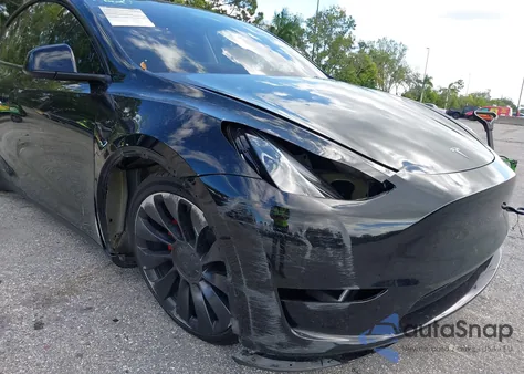2023 Tesla Model Y Performance Dual Motor All-Wheel Drive z USA, uszkodzony, nr VIN 7SAYGDEF9PF710418